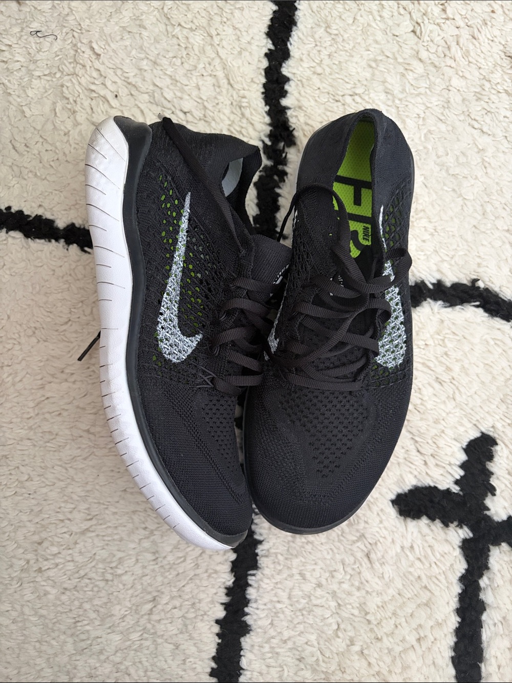 Nike Black Running Sneakers with White Swoosh and Lime Insole